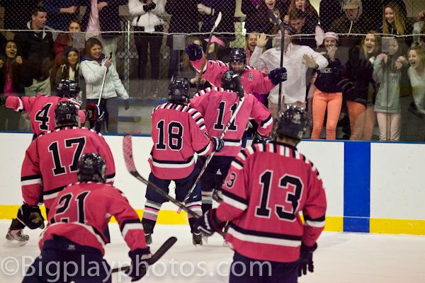 Boys varsity hockey “Pinks the Rink” and beats T-P