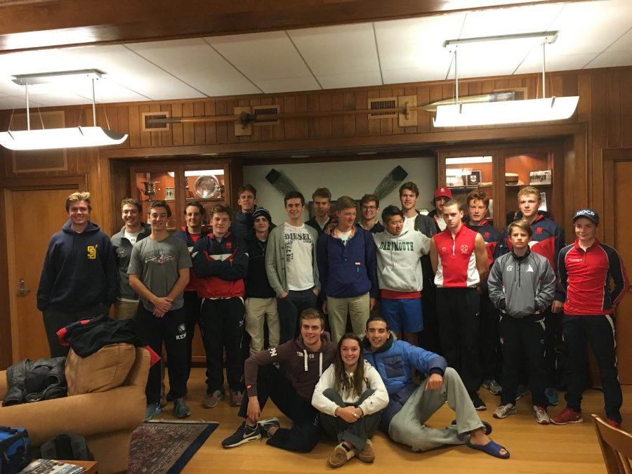 Radley students pose with Kent hosts at the boat house. 