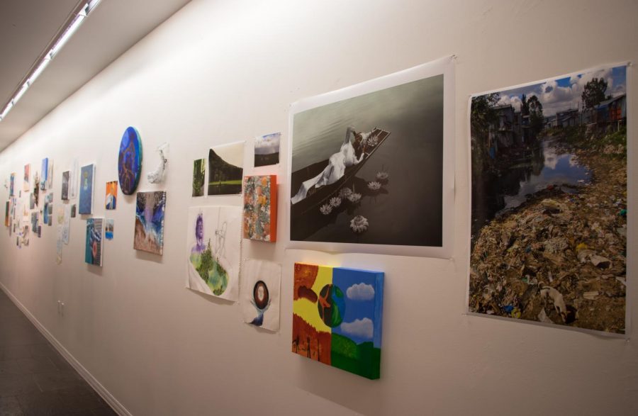 Works by teachers and students hang in the Walkway Gallery